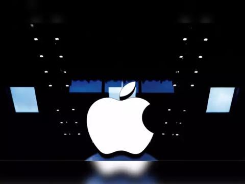 من iPhoneIslam.com، يظهر شعار التفاحة في غرفة مظلمة، ويتميز بتصميم جهاز قابل للطي.